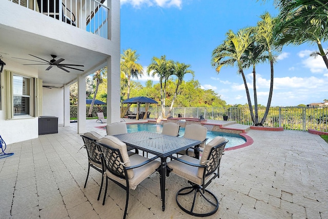 9606 Shepard Pl, Wellington, FL 33414 - fenced backyard featuring a ceiling fan, a patio area, outdoor dining area, and a balcony