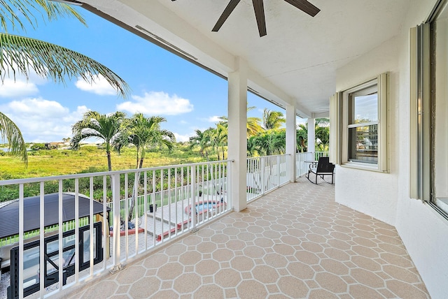 9606 Shepard Pl, Wellington, FL 33414 - unfurnished sunroom with ceiling fan
