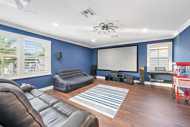 9606 Shepard Pl, Wellington, FL 33414 - cinema with ornamental molding, wood finished floors, baseboards, a textured ceiling, and healthy amount of natural light