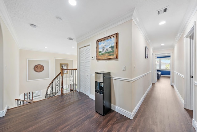 9606 Shepard Pl, Wellington, FL 33414 - hallway featuring an upstairs landing, dark wood-type flooring, crown molding, baseboards, and recessed lighting