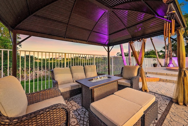 9606 Shepard Pl, Wellington, FL 33414 - view of patio / terrace with a gazebo and an outdoor living space with a fire pit