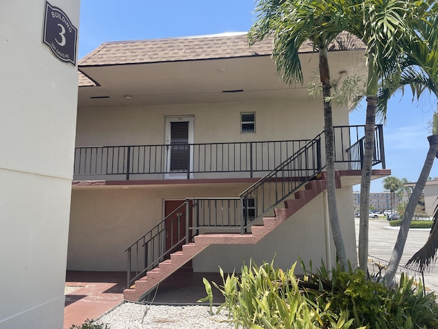 view of building exterior featuring stairway