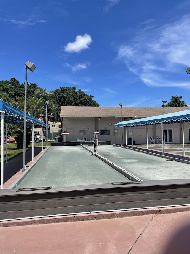view of property's community featuring a bocce ball area