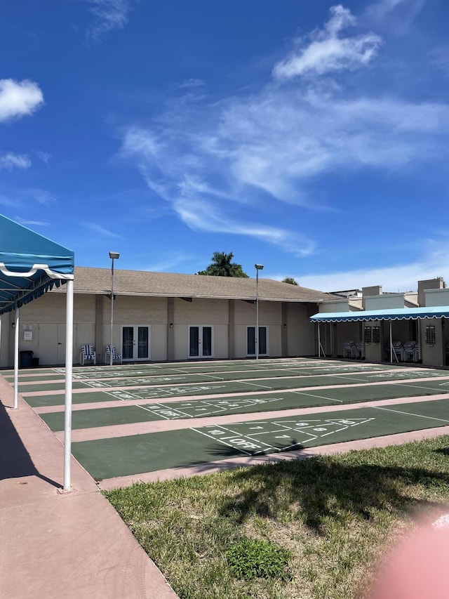 view of community with shuffleboard