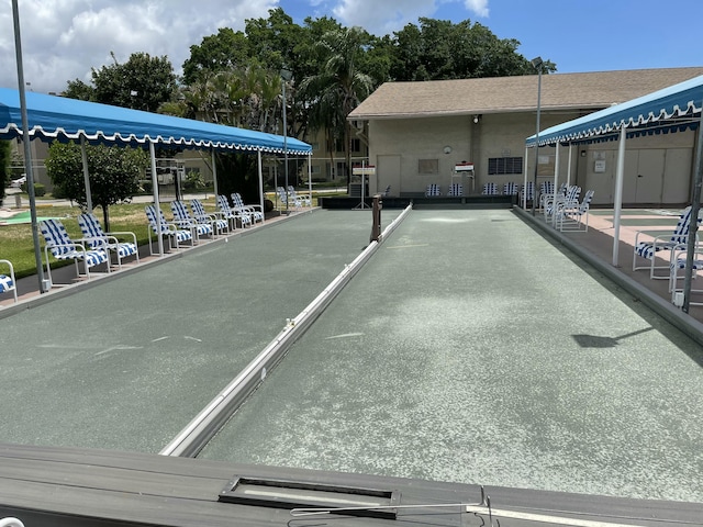 view of home's community featuring a bocce ball area