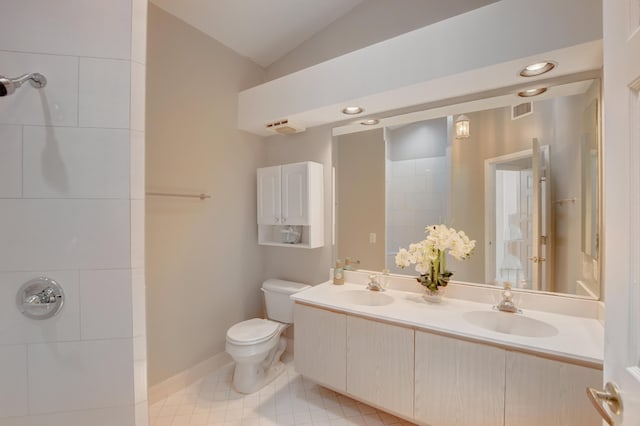 17215 Boca Club Blvd Unit 2, Boca Raton, FL 33487 - full bath with toilet, vaulted ceiling, double vanity, tile patterned flooring, and baseboards