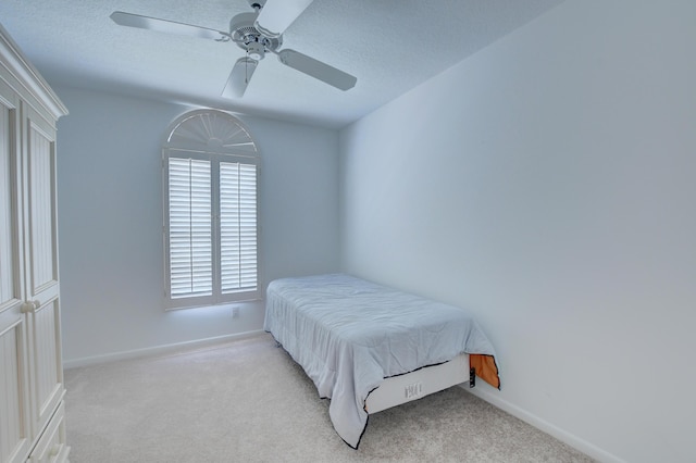 17215 Boca Club Blvd Unit 2, Boca Raton, FL 33487 - carpeted bedroom with baseboards, a ceiling fan, and a textured ceiling