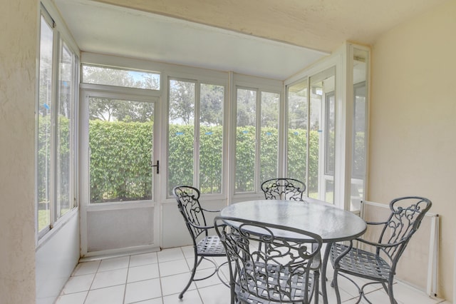17215 Boca Club Blvd Unit 2, Boca Raton, FL 33487 - sunroom with healthy amount of natural light, french doors, and tile patterned floors