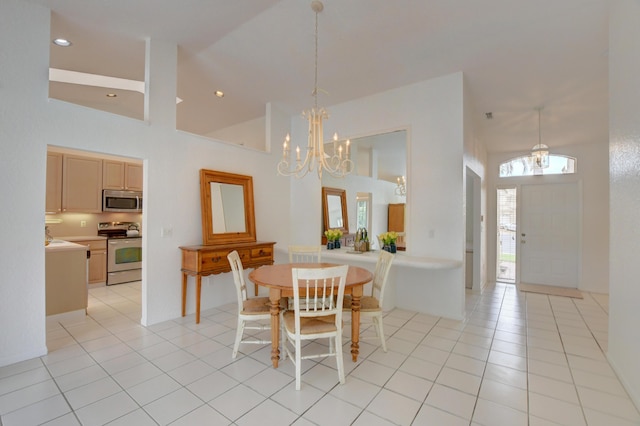 17215 Boca Club Blvd Unit 2, Boca Raton, FL 33487 - dining room featuring a chandelier, high vaulted ceiling, and light tile patterned flooring