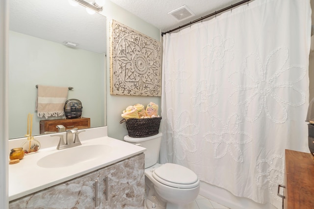 full bathroom featuring toilet, vanity, a textured ceiling, tile patterned floors, and shower / bath combination with curtain