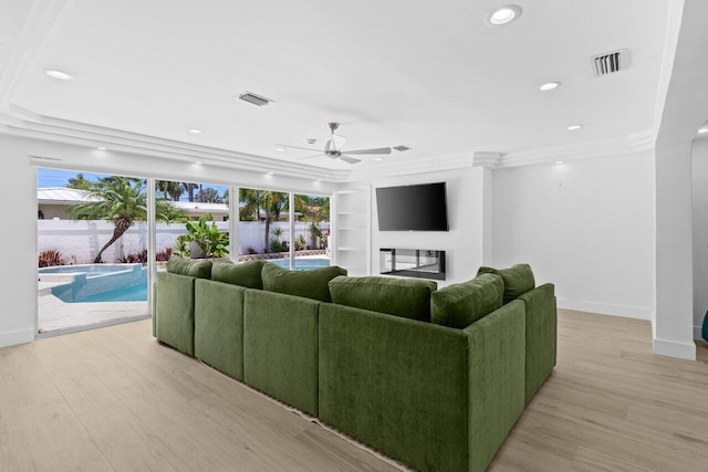 2611 NE 49th St, Lighthouse Point, FL 33064 - living room with ceiling fan, light wood finished floors, built in features, baseboards, and recessed lighting