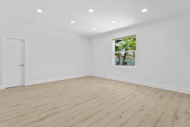 2611 NE 49th St, Lighthouse Point, FL 33064 - unfurnished room featuring ornamental molding, light wood-style flooring, recessed lighting, and baseboards