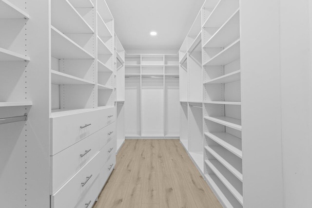 2611 NE 49th St, Lighthouse Point, FL 33064 - walk in closet featuring light wood finished floors