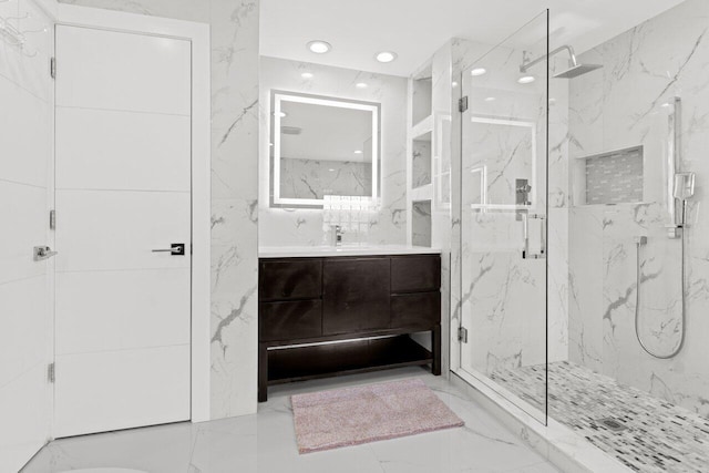 2611 NE 49th St, Lighthouse Point, FL 33064 - bathroom with marble tiled floors, a marble finish shower, vanity, and recessed lighting