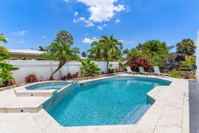 2611 NE 49th St, Lighthouse Point, FL 33064 - view of pool featuring a fenced backyard, a patio, and a pool with connected hot tub