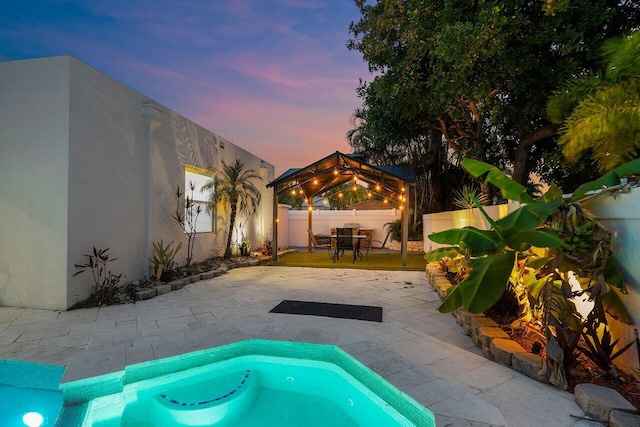2611 NE 49th St, Lighthouse Point, FL 33064 - view of swimming pool with a gazebo, outdoor dining space, a patio, and a fenced backyard