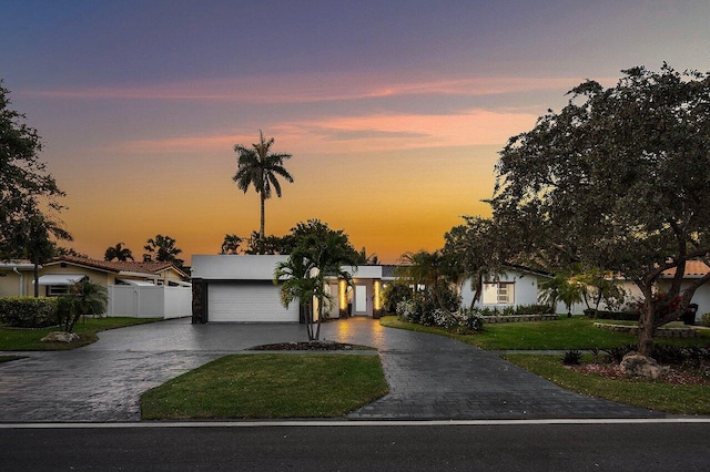 2611 NE 49th St, Lighthouse Point, FL 33064 - view of front of home with decorative driveway and an attached garage