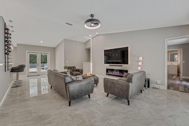 11849 59th St N, Royal Palm Beach, FL 33411 - living room featuring light marble finish floors, vaulted ceiling, french doors, baseboards, and recessed lighting
