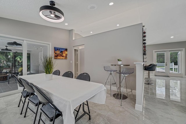 11849 59th St N, Royal Palm Beach, FL 33411 - dining area with french doors, light marble finish flooring, recessed lighting, and baseboards