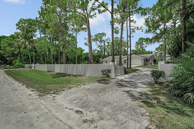 11849 59th St N, Royal Palm Beach, FL 33411 - view of road featuring a gate