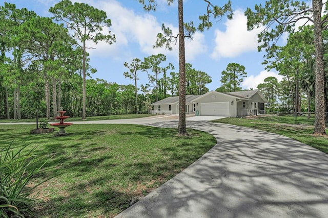 11849 59th St N, Royal Palm Beach, FL 33411 - single story home with an attached garage, a front yard, and driveway