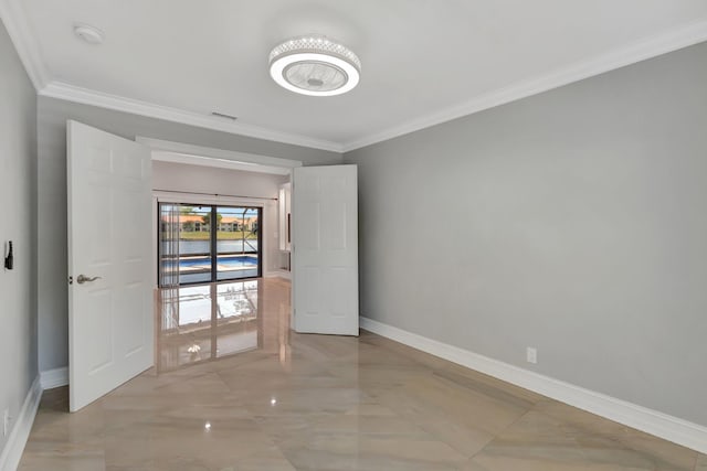3 Independence Ct, Deerfield Beach, FL 33442 - empty room featuring baseboards, ornamental molding, a smoke detector, and light marble finish flooring
