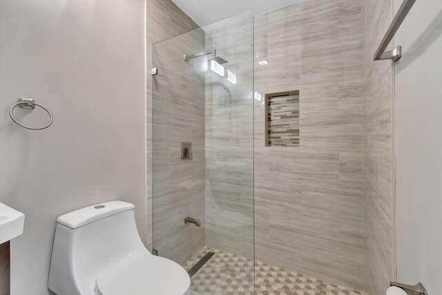 3 Independence Ct, Deerfield Beach, FL 33442 - bathroom featuring a walk in shower and toilet