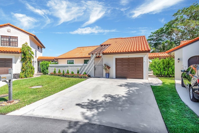 3 Independence Ct, Deerfield Beach, FL 33442 - mediterranean / spanish-style home featuring driveway, stucco siding, a tile roof, an attached garage, and a gate