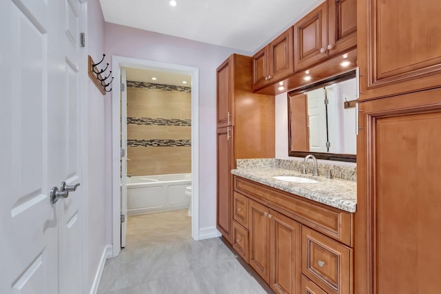 3 Independence Ct, Deerfield Beach, FL 33442 - bathroom featuring vanity, toilet, baseboards, and shower / bath combination