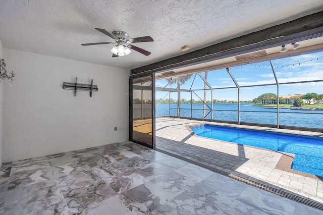 3 Independence Ct, Deerfield Beach, FL 33442 - outdoor pool featuring a patio area, a water view, ceiling fan, and a lanai