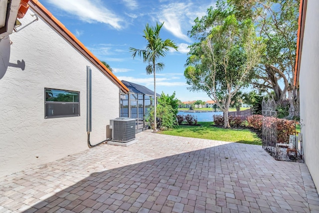 3 Independence Ct, Deerfield Beach, FL 33442 - view of patio with central AC and a water view