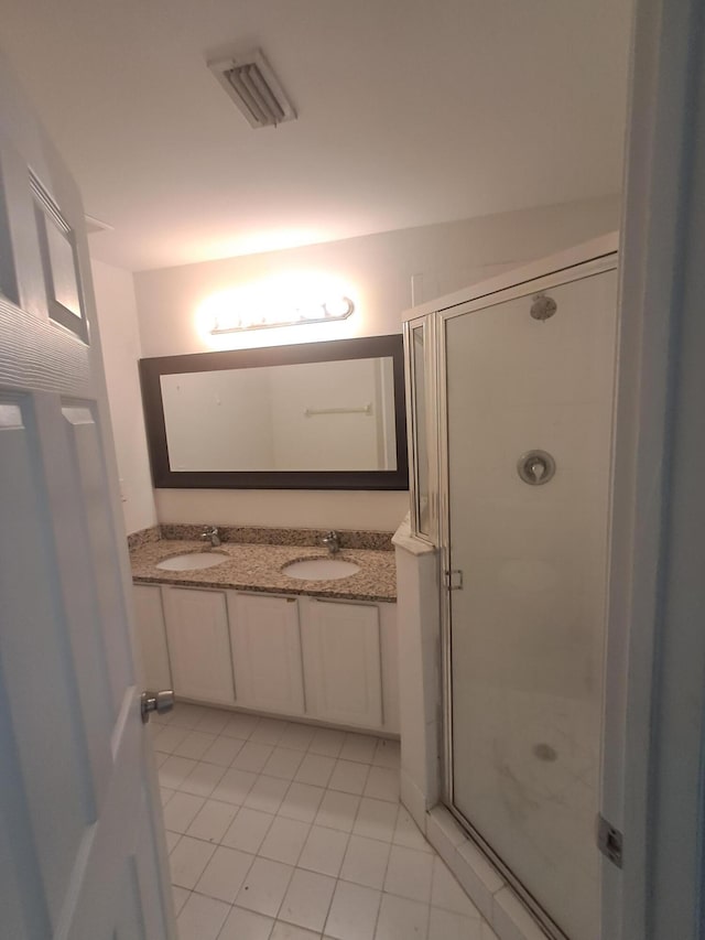4964 Palmbrooke Cir, West Palm Beach, FL 33417 - full bath featuring tile patterned floors, a stall shower, and double vanity