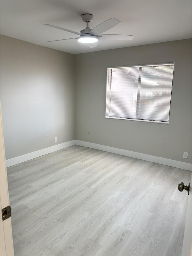 14814 Wildflower Ln, Delray Beach, FL 33446 - unfurnished room featuring ceiling fan, light wood-type flooring, and baseboards