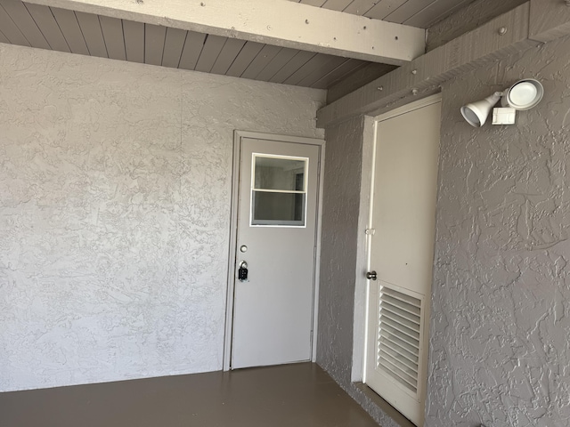 14814 Wildflower Ln, Delray Beach, FL 33446 - doorway to property featuring stucco siding