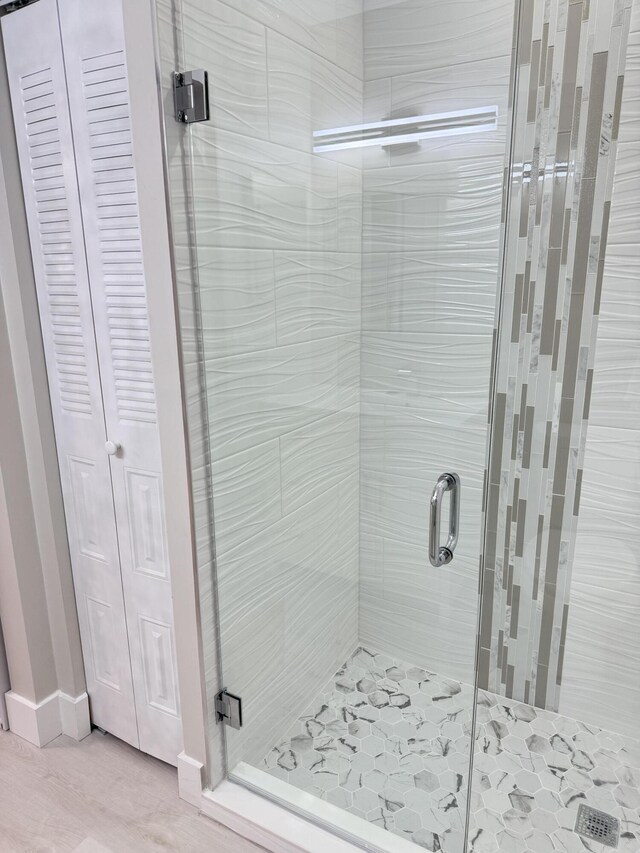 14814 Wildflower Ln, Delray Beach, FL 33446 - bathroom with a stall shower and a closet