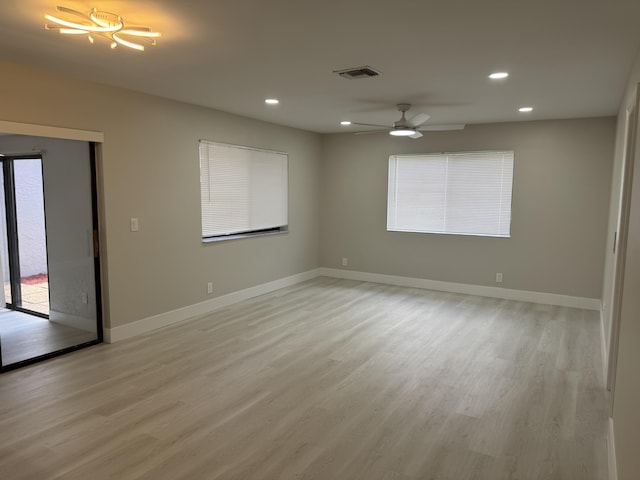 14814 Wildflower Ln, Delray Beach, FL 33446 - spare room featuring recessed lighting, light wood-type flooring, baseboards, and ceiling fan