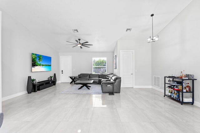 12111 Sugar Pine Trl, Wellington, FL 33414 - living area featuring baseboards, ceiling fan, light tile patterned floors, vaulted ceiling, and a chandelier