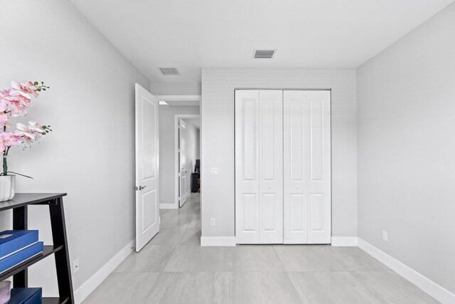 12111 Sugar Pine Trl, Wellington, FL 33414 - unfurnished bedroom with baseboards and a closet