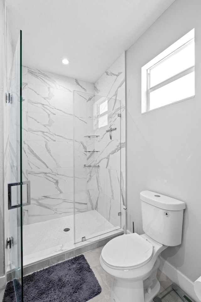 12111 Sugar Pine Trl, Wellington, FL 33414 - bathroom featuring toilet, a marble finish shower, recessed lighting, and baseboards