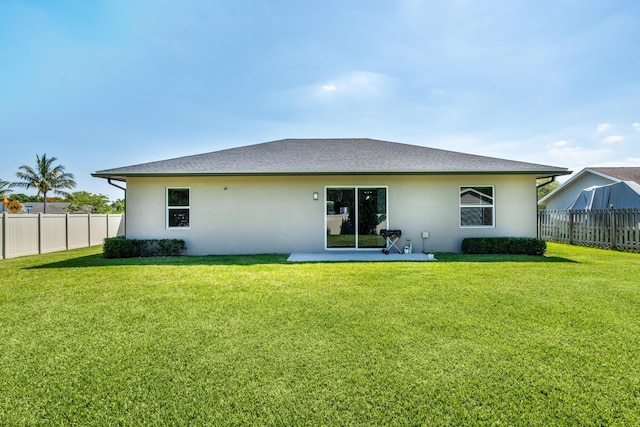 12111 Sugar Pine Trl, Wellington, FL 33414 - rear view of house with stucco siding and a patio area