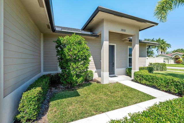 12111 Sugar Pine Trl, Wellington, FL 33414 - entrance to property featuring a lawn