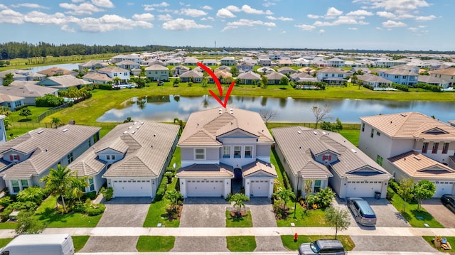 5968 Jasmine Ln, Westlake, FL 33470 - aerial perspective of suburban area with a nearby body of water