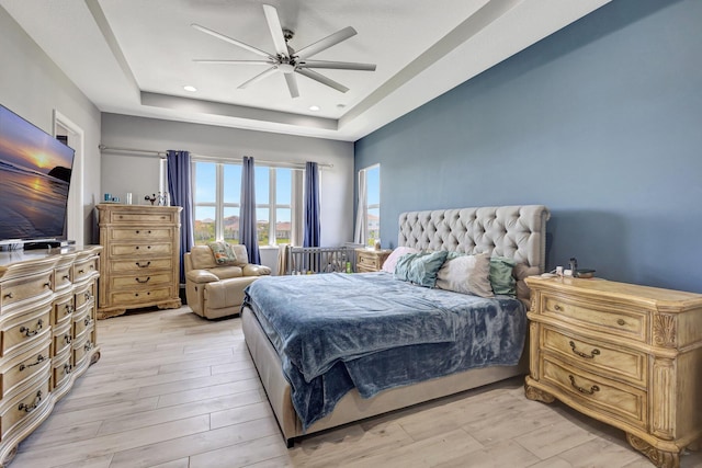 5968 Jasmine Ln, Westlake, FL 33470 - bedroom with a tray ceiling, light wood-type flooring, recessed lighting, and a ceiling fan