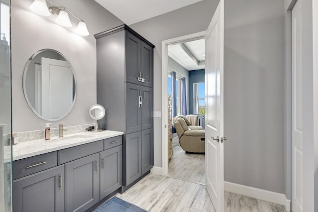 5968 Jasmine Ln, Westlake, FL 33470 - ensuite bathroom with vanity and baseboards