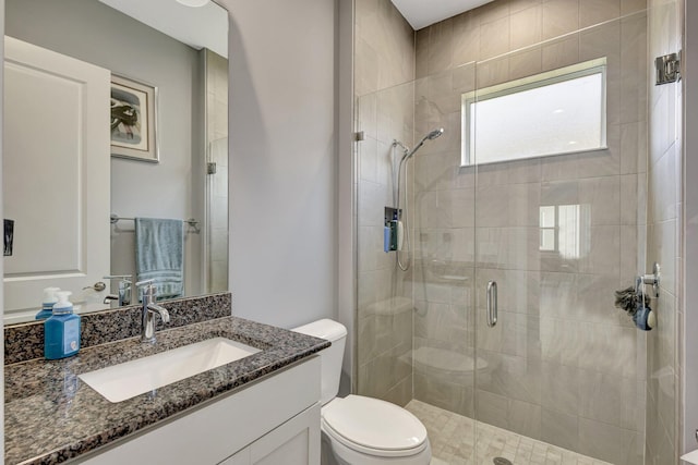 5968 Jasmine Ln, Westlake, FL 33470 - full bathroom featuring a stall shower, toilet, and vanity
