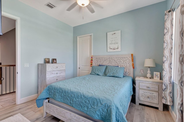 5968 Jasmine Ln, Westlake, FL 33470 - bedroom featuring wood finished floors, baseboards, and a ceiling fan