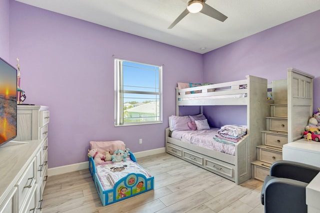 5968 Jasmine Ln, Westlake, FL 33470 - bedroom featuring light wood-style flooring, baseboards, and a ceiling fan