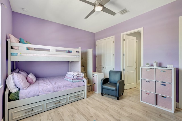 5968 Jasmine Ln, Westlake, FL 33470 - bedroom featuring light wood finished floors, a ceiling fan, and a closet
