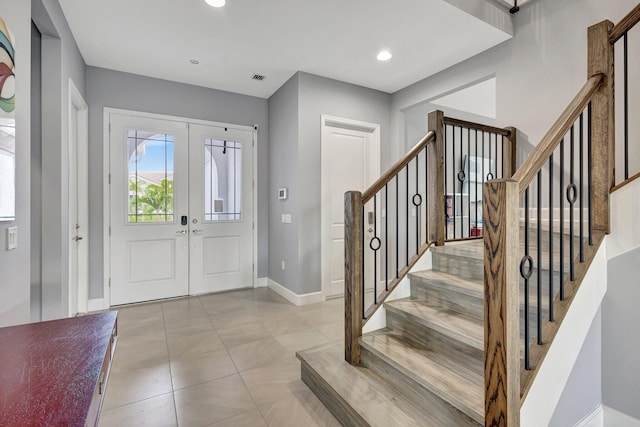 5968 Jasmine Ln, Westlake, FL 33470 - foyer with baseboards, stairs, and recessed lighting