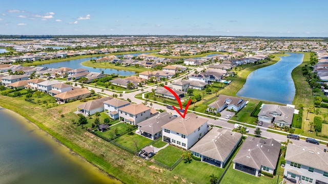 5968 Jasmine Ln, Westlake, FL 33470 - aerial view of residential area featuring a large body of water